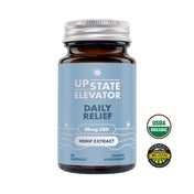 CBD supplement bottle labeled 'Upstate Elevator Daily Relief' with organic certification logos on a white background
